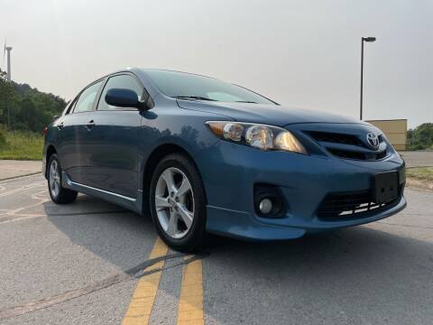 2013 Toyota Corolla for sale at Jim's Hometown Auto Sales LLC in Cambridge OH