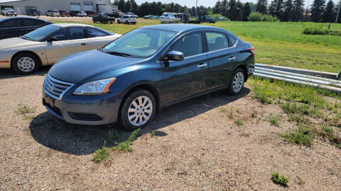 2014 Nissan Sentra for sale at BERG AUTO MALL & TRUCKING INC in Beresford SD