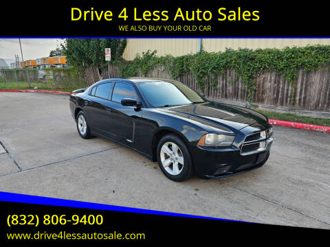 2013 Dodge Charger for sale at Drive 4 Less Auto Sales in Houston TX