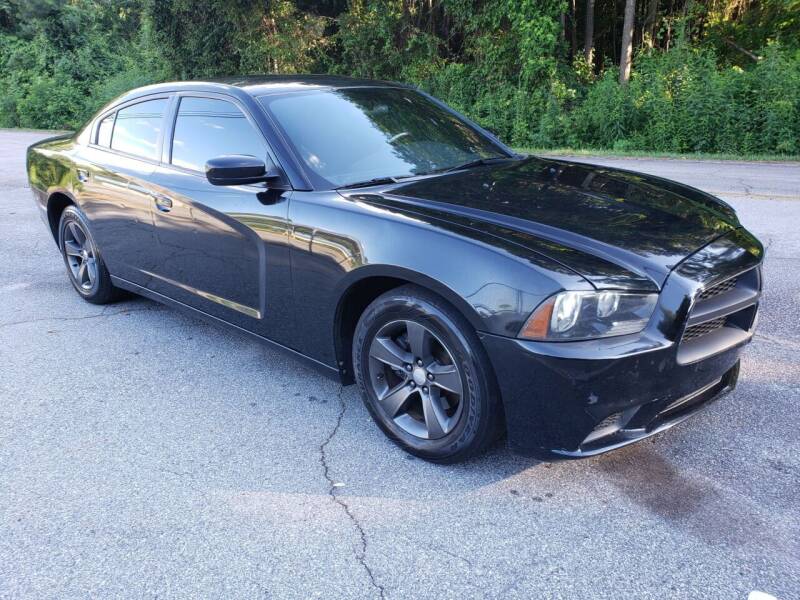 2012 Dodge Charger for sale at GEORGIA AUTO DEALER LLC in Buford GA