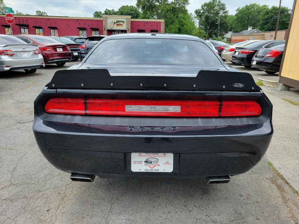 2014 Dodge Challenger for sale at DAGO'S AUTO SALES LLC in Dalton, GA