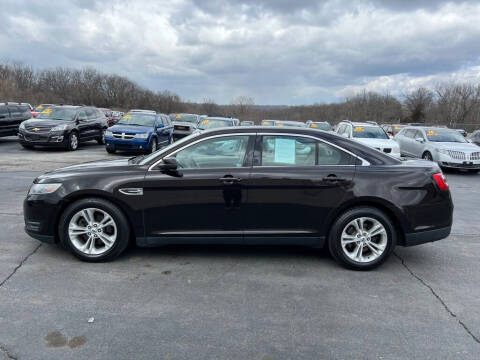 2013 Ford Taurus for sale at CARS PLUS CREDIT in Independence MO