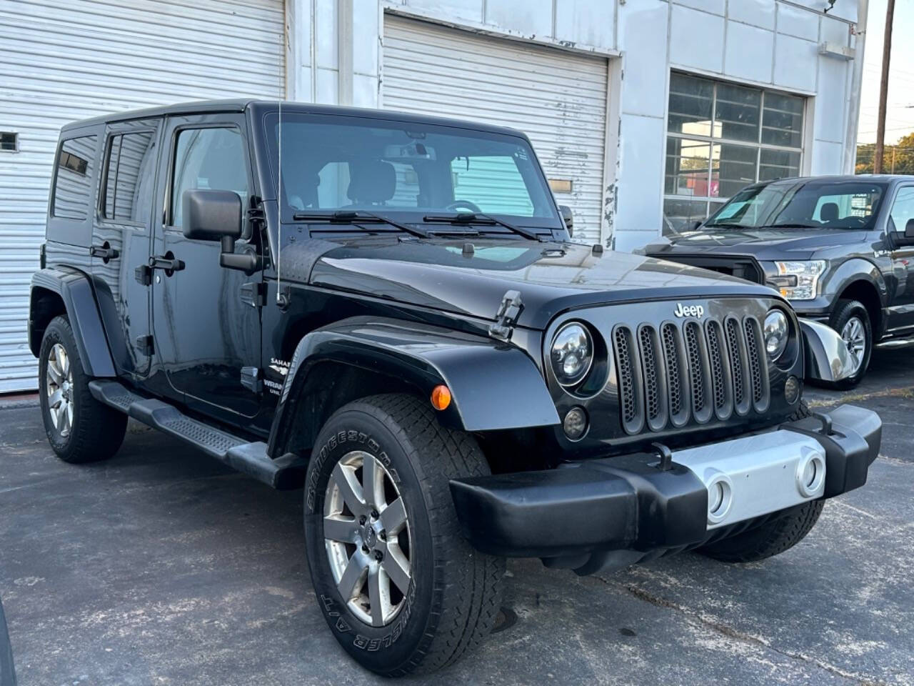 2013 Jeep Wrangler Unlimited for sale at Prompt Luxury Cars LLC in Austell, GA