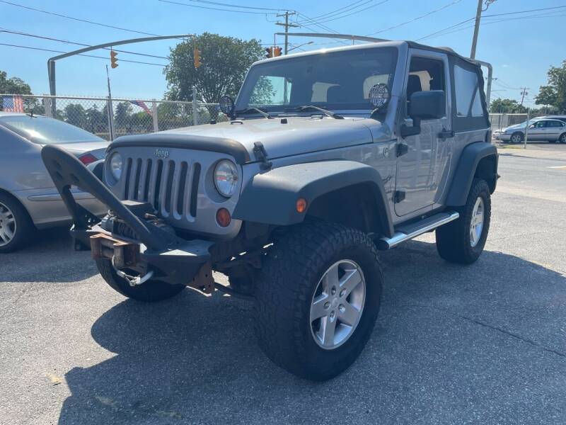 2013 Jeep Wrangler for sale at American Best Auto Sales in Uniondale NY