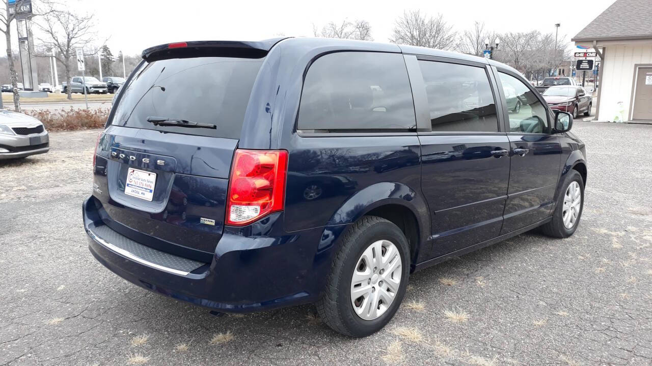 2014 Dodge Grand Caravan for sale at CHRISTIAN AUTO SALES in Anoka, MN