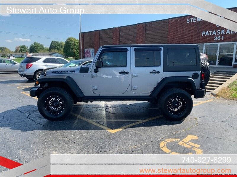 2016 Jeep Wrangler Unlimited for sale at Stewart Auto Group in Pataskala, OH