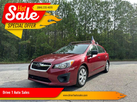 2014 Subaru Impreza for sale at Drive 1 Auto Sales in Wake Forest NC