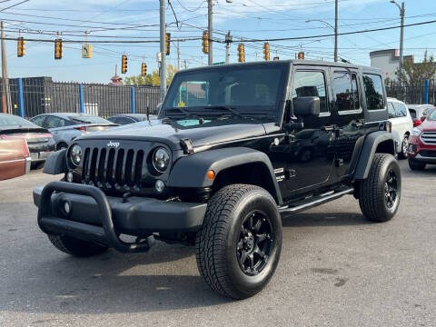 2015 Jeep Wrangler Unlimited for sale at SKYLINE AUTO in Detroit MI