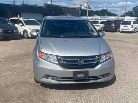 2015 Honda Odyssey for sale at Castle Cars Inc. in Lansing MI