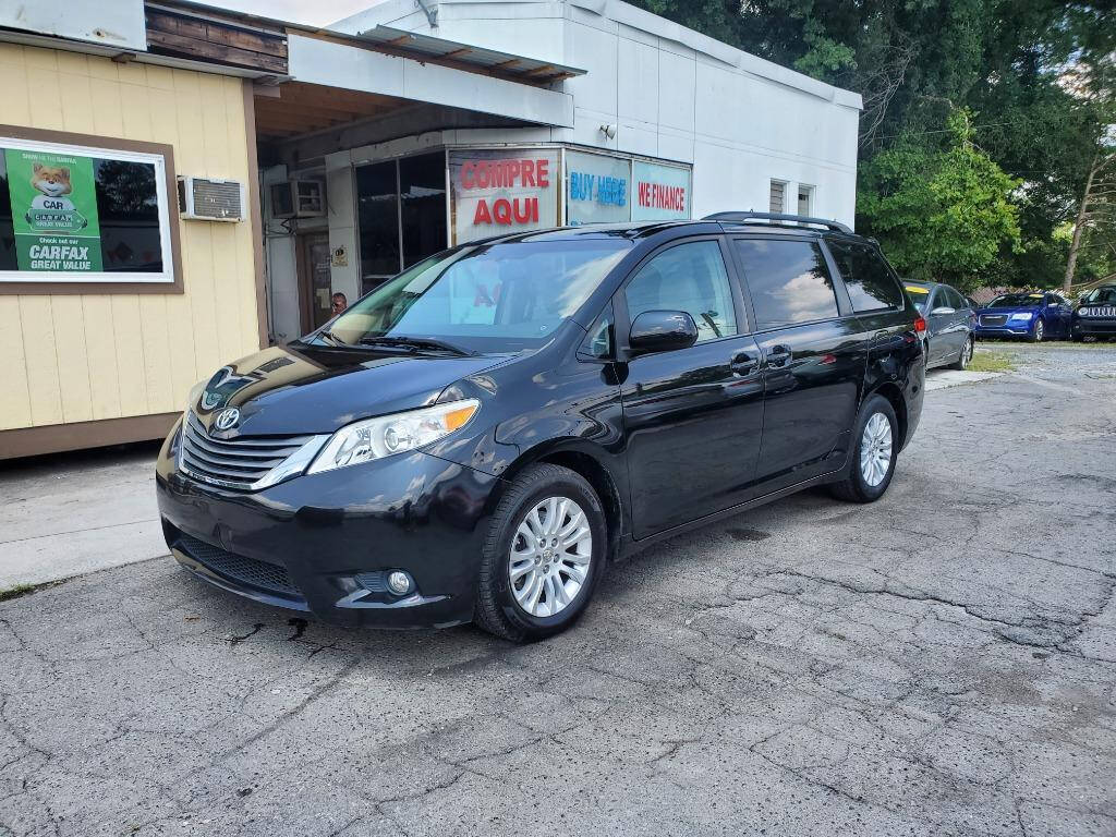 2013 Toyota Sienna for sale at DAGO'S AUTO SALES LLC in Dalton, GA