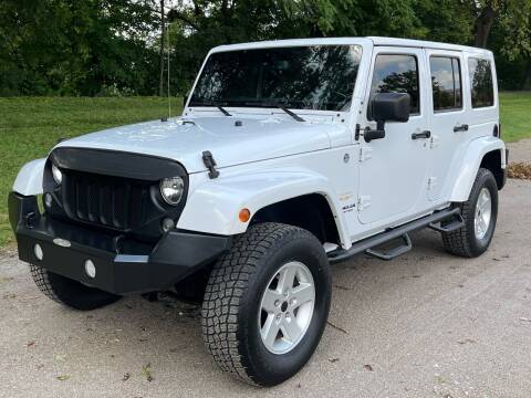 2015 Jeep Wrangler Unlimited for sale at GLASS CITY AUTO CENTER in Lancaster OH