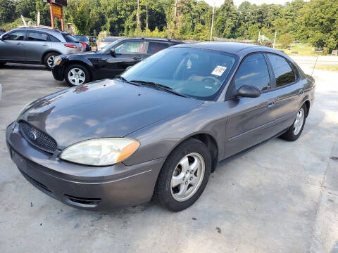 2005 Ford Taurus for sale at Palmer Automobile Sales in Decatur GA