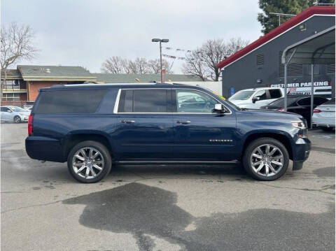 2017 Chevrolet Suburban for sale at Armando Auto Sales in Fresno CA