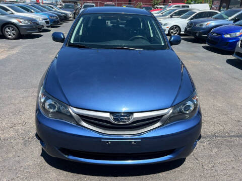 2011 Subaru Impreza for sale at SANAA AUTO SALES LLC in Englewood CO