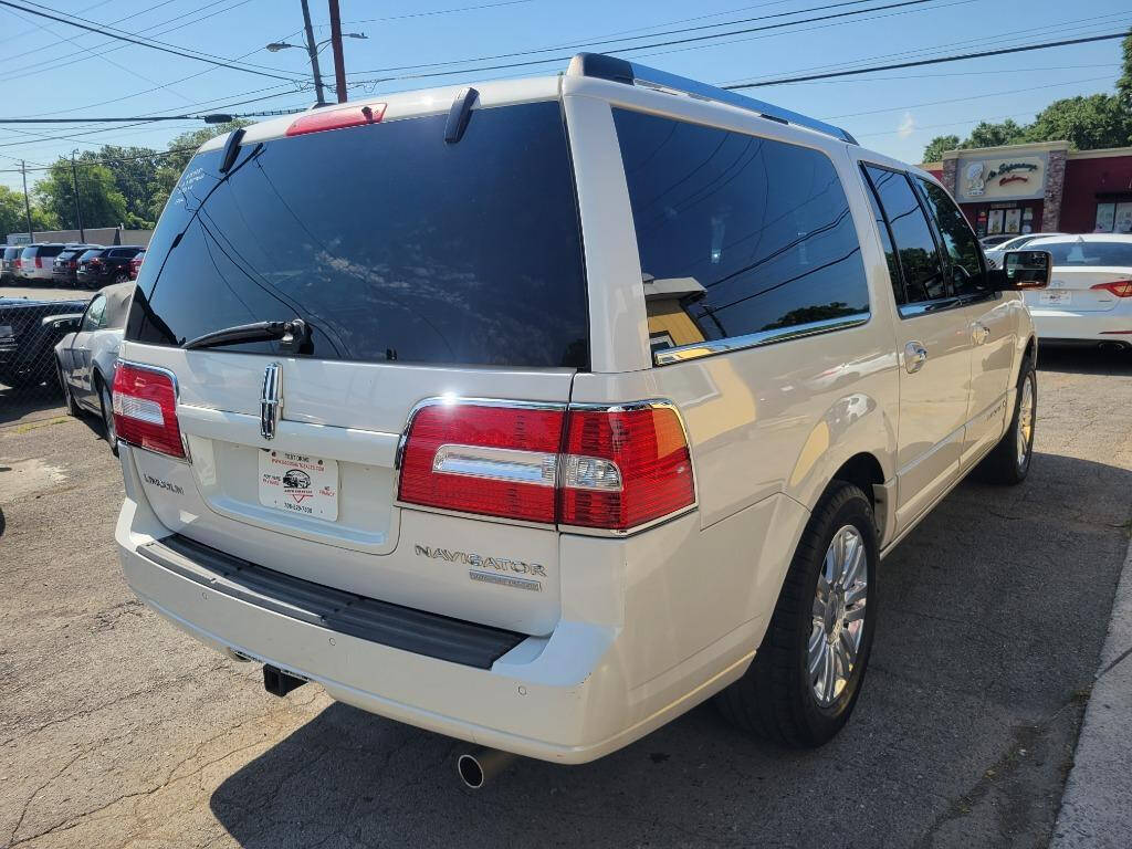 2013 Lincoln Navigator L for sale at DAGO'S AUTO SALES LLC in Dalton, GA