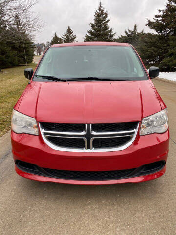 2013 Dodge Grand Caravan for sale at Roman's Auto Sales in Warren MI