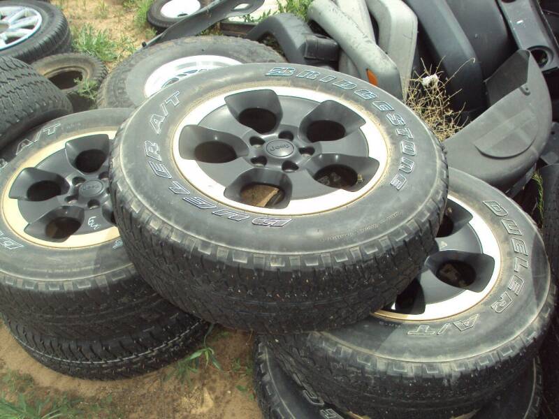  Jeep TIRES for sale at BENHAM AUTO INC - Peace of Mind Auto Collision and Repair in Lubbock TX