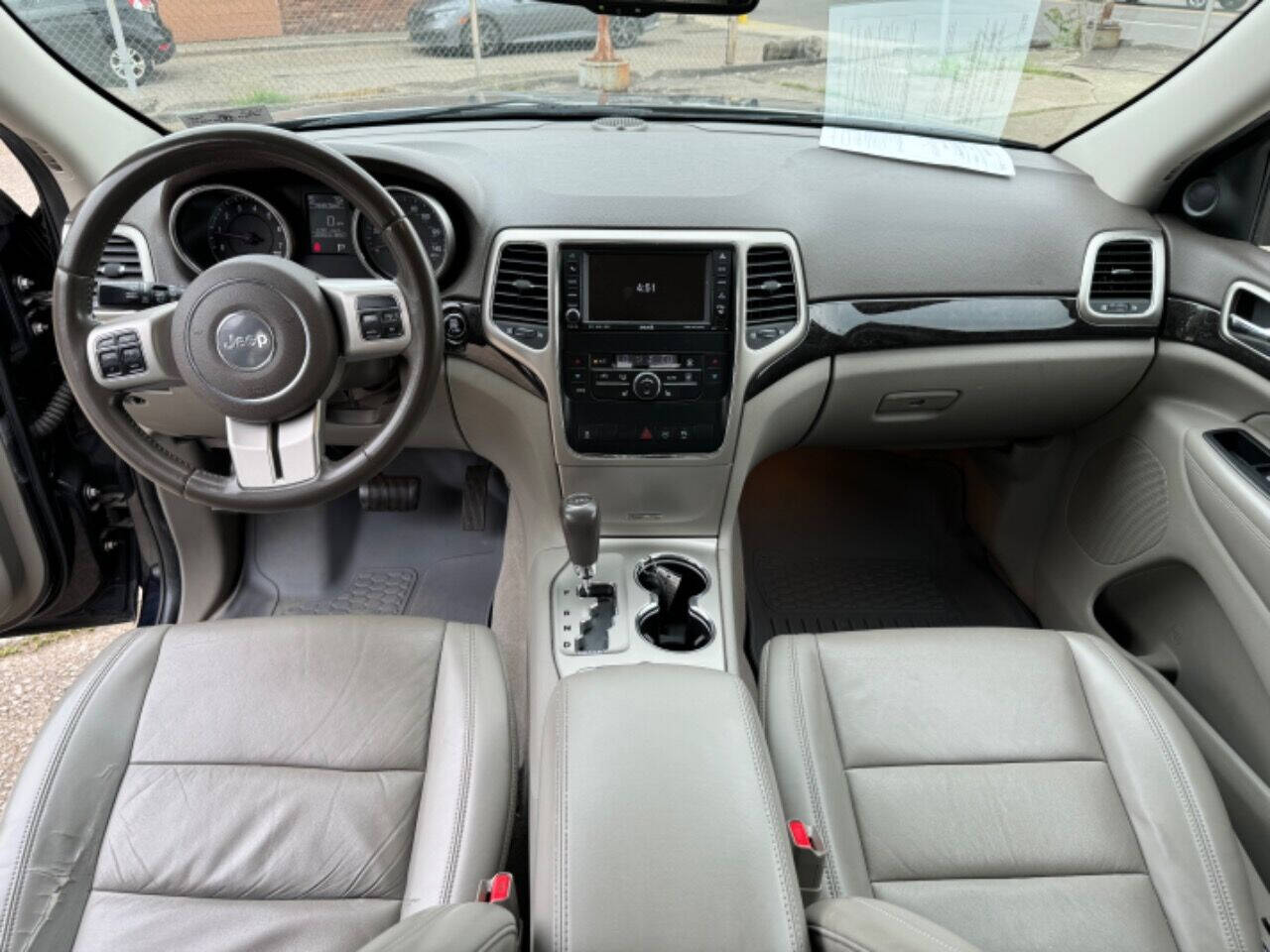 2011 Jeep Grand Cherokee for sale at First Class Auto Mall in Akron, OH