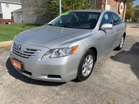 2009 Toyota Camry for sale at REVOLUTION MOTORS LLC in Waukegan IL