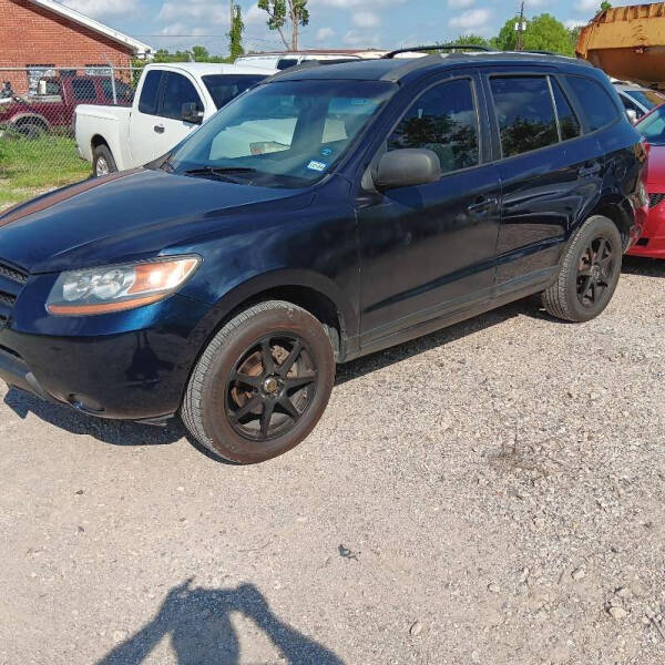 2009 Hyundai Santa Fe for sale at SCOTT HARRISON MOTOR CO in Houston TX