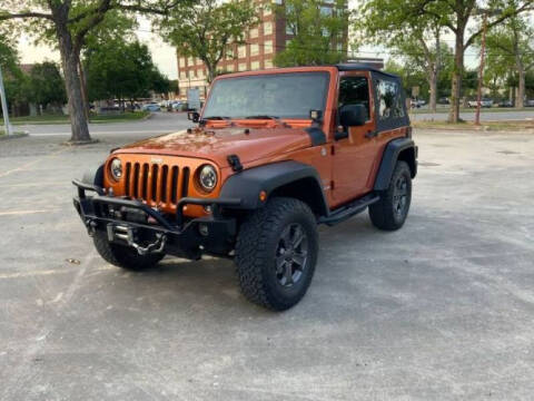2011 Jeep Wrangler for sale at Classic Car Deals in Cadillac MI