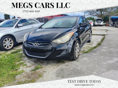 2013 Hyundai Elantra for sale at Megs Cars LLC in Fort Pierce FL