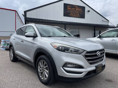 2016 Hyundai Tucson for sale at BELOW BOOK AUTO SALES in Idaho Falls ID