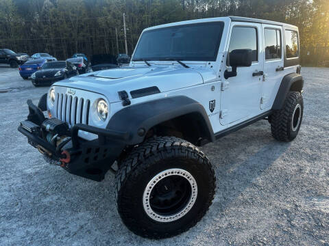 2014 Jeep Wrangler Unlimited for sale at Gwinnett Luxury Motors in Buford GA