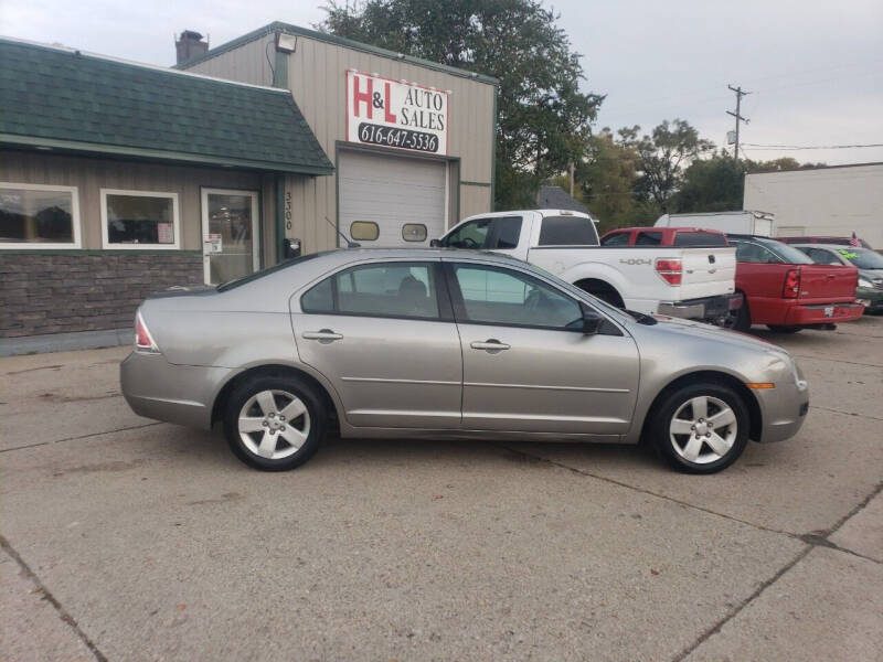 2008 Ford Fusion for sale at H & L AUTO SALES LLC in Wyoming MI