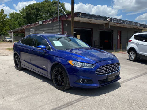 2013 Ford Fusion Hybrid for sale at Texas Luxury Auto in Houston TX