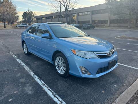 2013 Toyota Camry for sale at QUEST MOTORS in Englewood CO
