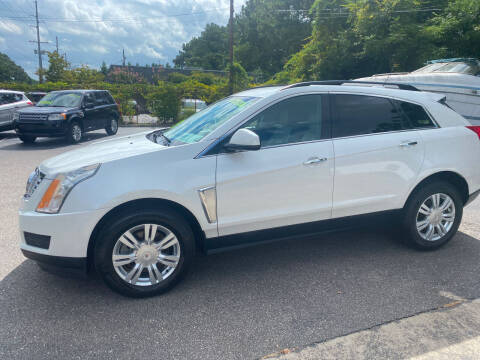 2015 Cadillac SRX for sale at TOP OF THE LINE AUTO SALES in Fayetteville NC