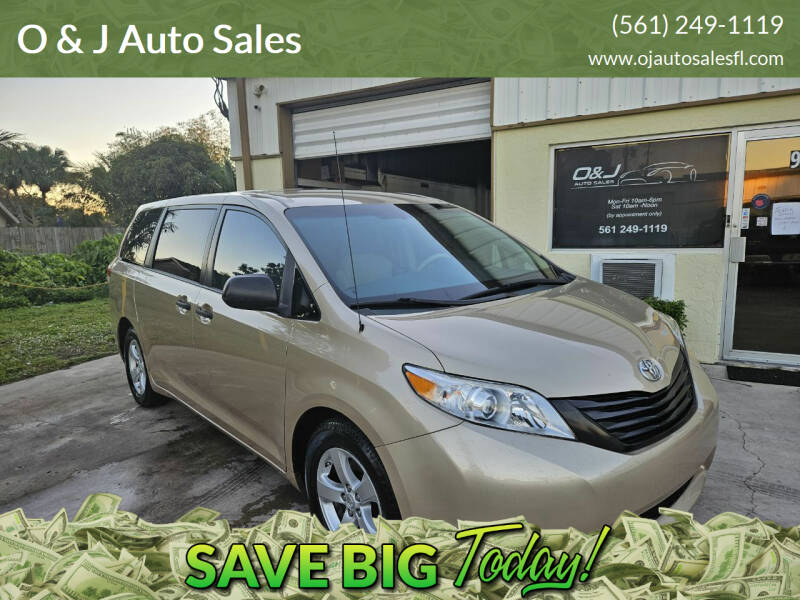 2014 Toyota Sienna for sale at O & J Auto Sales in Royal Palm Beach FL