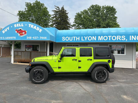 2012 Jeep Wrangler Unlimited for sale at South Lyon Motors INC in South Lyon MI
