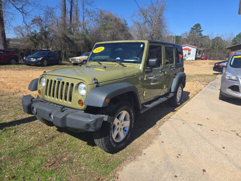 2013 Jeep Wrangler Unlimited for sale at Northwood Auto Sales in Buhl AL