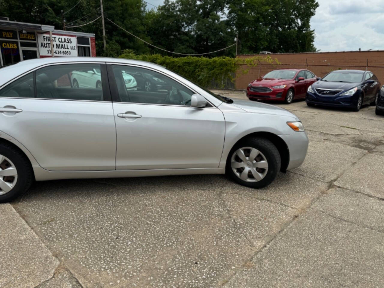 2009 Toyota Camry for sale at First Class Auto Mall in Akron, OH