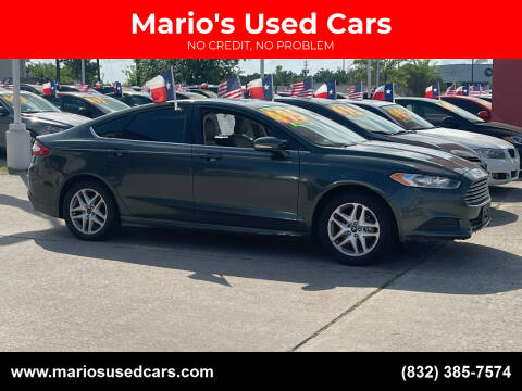 2015 Ford Fusion for sale at Mario's Used Cars in Houston TX