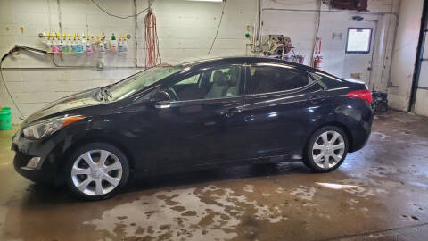 2013 Hyundai Elantra for sale at North Metro Auto Sales in Cambridge MN