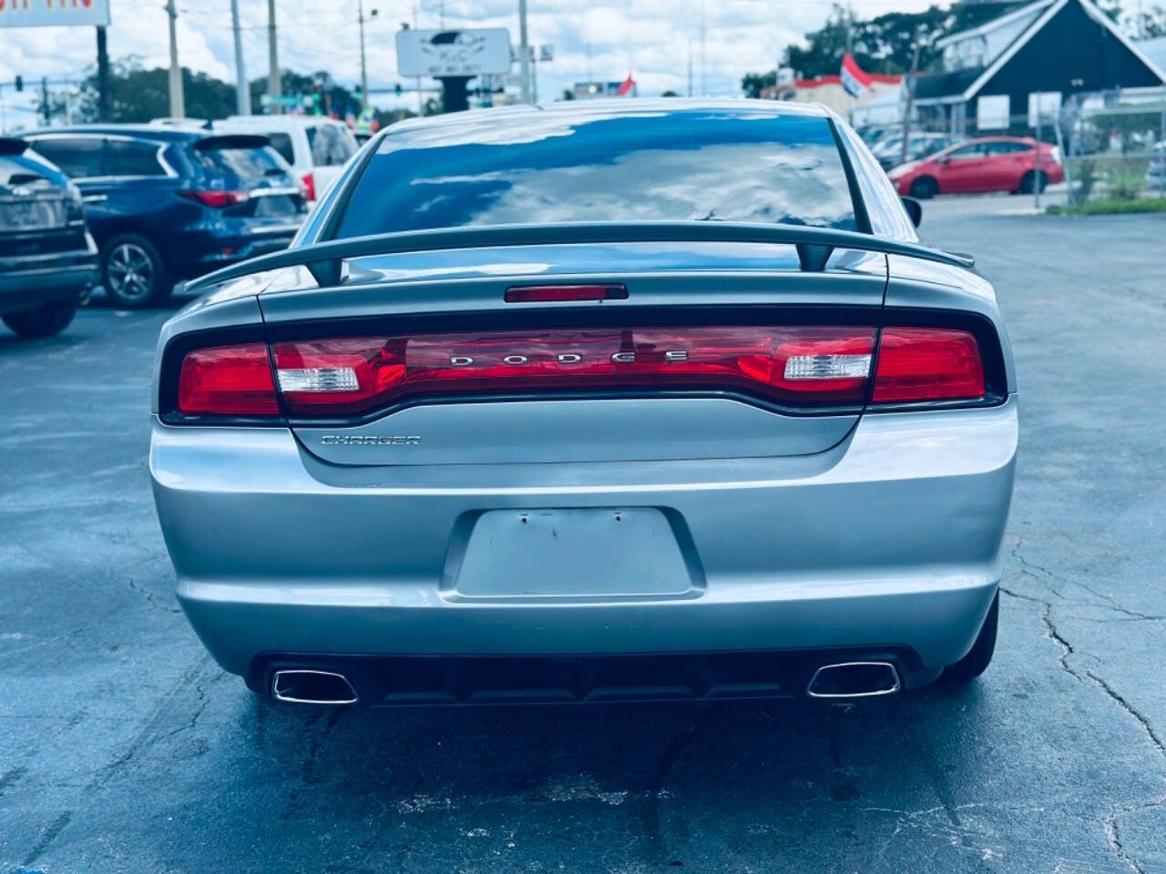 2013 Dodge Charger for sale at NOVA AUTO SALES in Orlando, FL