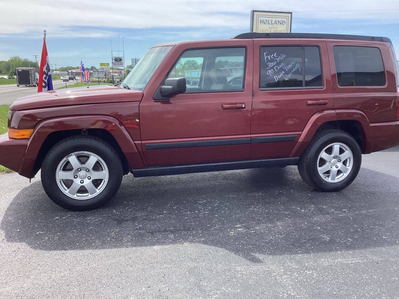Red 2009 Jeep Commander Sport 4x4 Sport 4dr SUV 2
