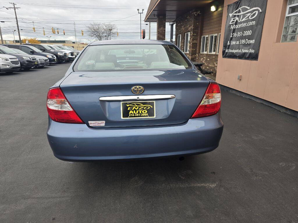 2003 Toyota Camry for sale at ENZO AUTO in Parma, OH