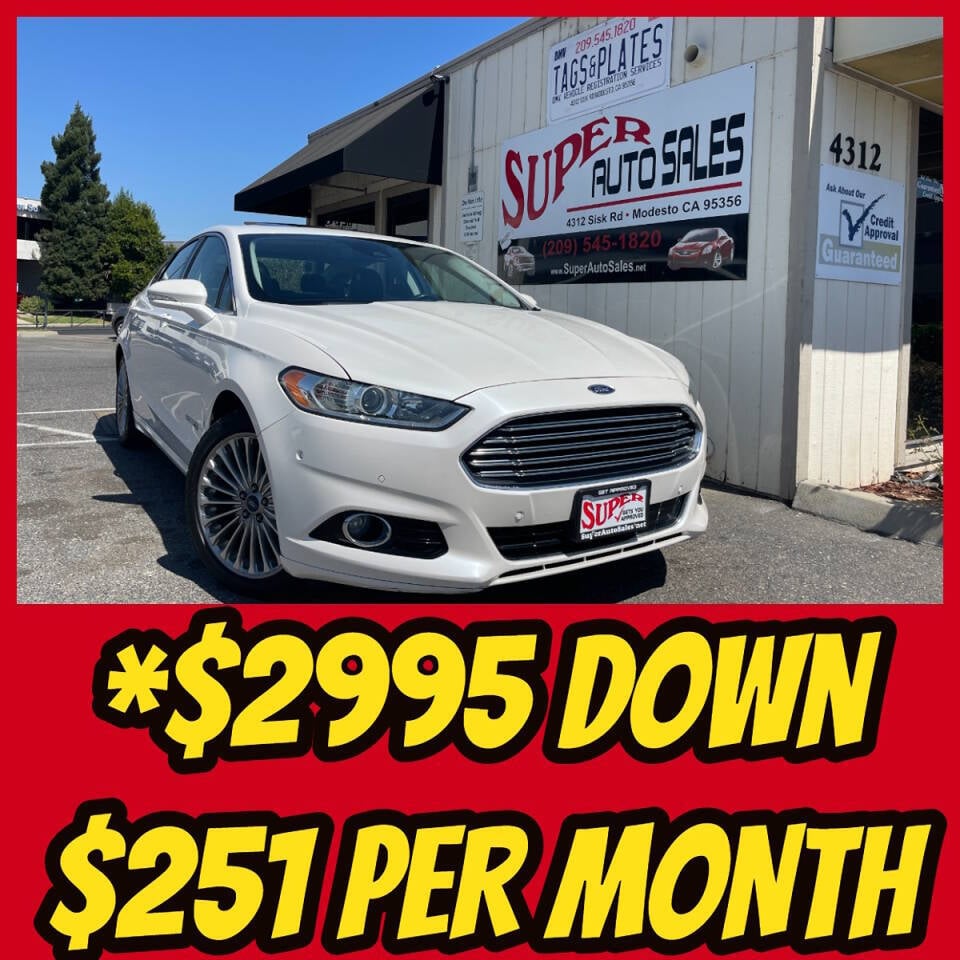 2014 Ford Fusion Hybrid for sale at Super Auto Sales Modesto in Modesto, CA