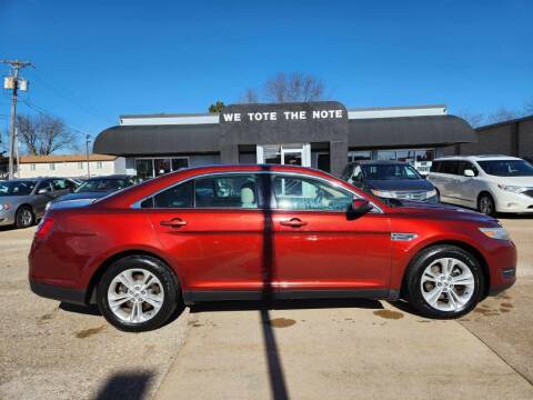 2014 Ford Taurus for sale at First Choice Auto Sales in Moline IL
