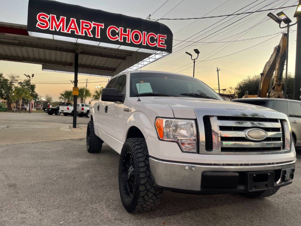 2009 Ford F-150 for sale at SMART CHOICE AUTO in Pasadena, TX