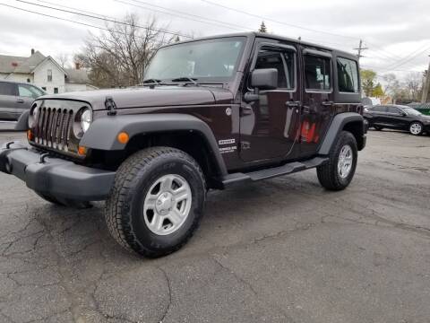 2013 Jeep Wrangler Unlimited for sale at DALE'S AUTO INC in Mount Clemens MI