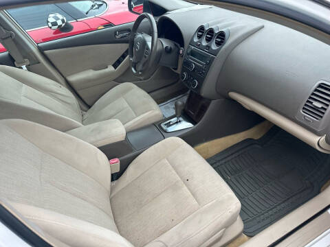 2011 Nissan Altima for sale at Buy-Fast Autos in Houston TX