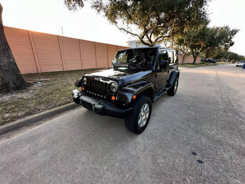 2013 Jeep Wrangler Unlimited for sale at Demetry Automotive in Houston TX