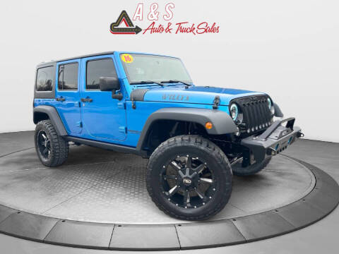 2016 Jeep Wrangler Unlimited for sale at A & S Auto and Truck Sales in Platte City MO
