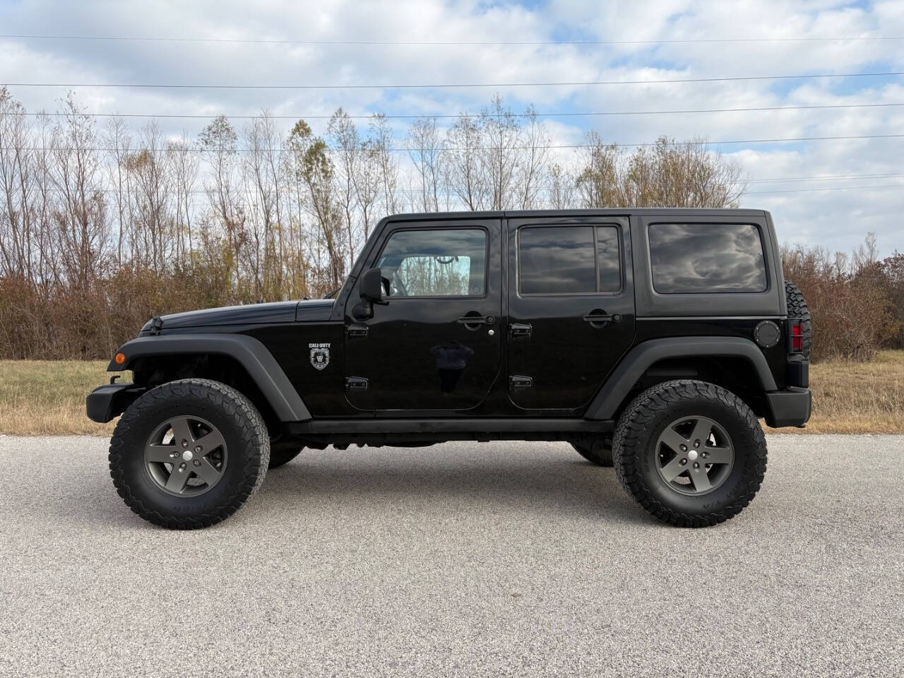 2011 Jeep Wrangler Unlimited for sale at Q3 AUTO LLC in Hayti, MO