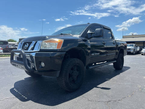 2013 Nissan Titan for sale at AJOULY AUTO SALES in Moore OK